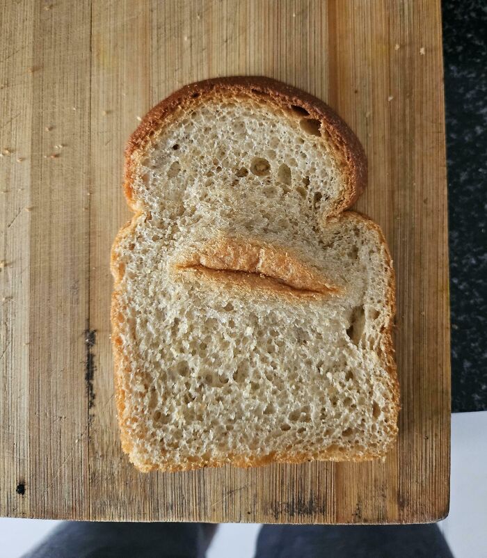 Pareidolia toasted slice of bread with crust pattern like lips