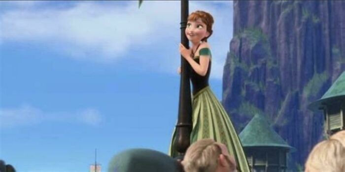 Frozen's Anna, smiling and looking up, in a street scene from a movie, highlighting nonsensical movie details.