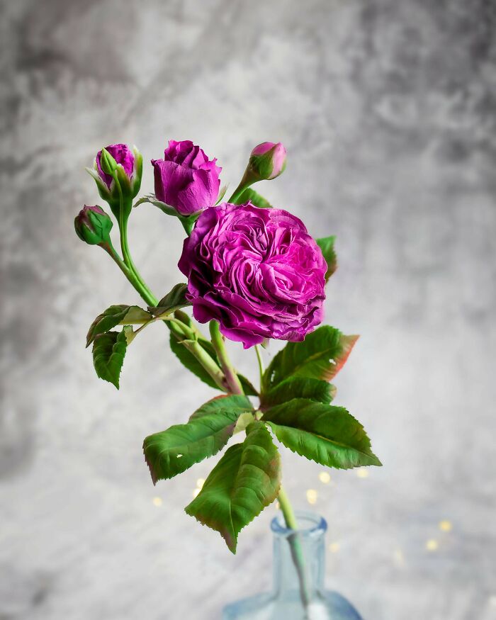 A vibrant purple handmade flower in a vase, showcasing a beautiful handmade project.
