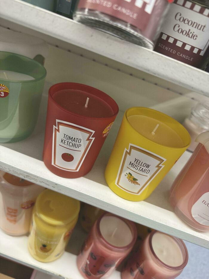 Tomato ketchup and yellow mustard scented candles on a store shelf