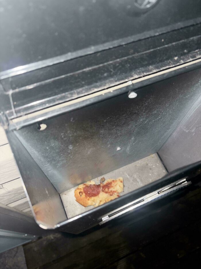 Slice of pepperoni pizza found inside empty metal mailbox