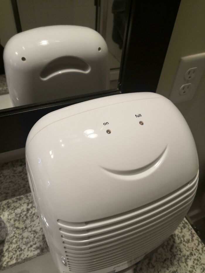 Humidifier with reflection creates sad and happy face illusion pareidolia
