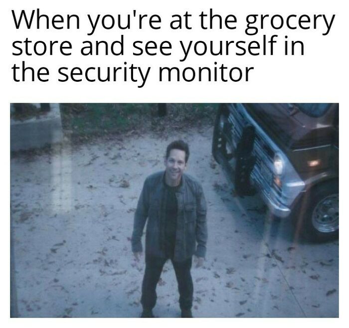Paul Rudd smiling in a grainy security monitor footage. A very relatable meme about seeing yourself on screen.