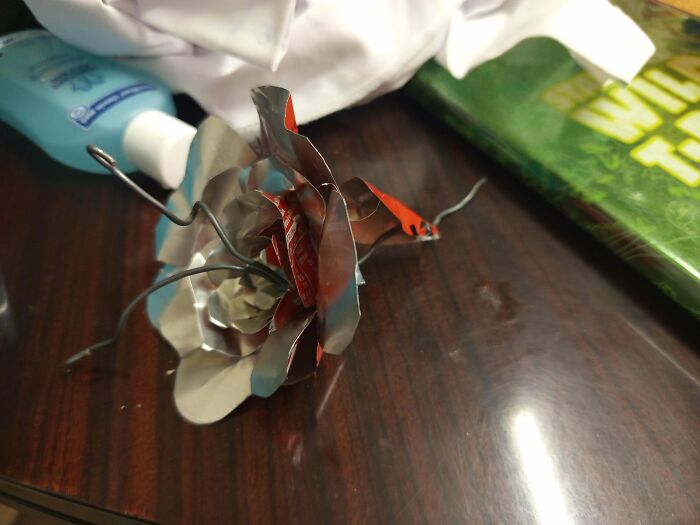 A handmade metal rose, a creative project that took talent to craft into this unique flower.