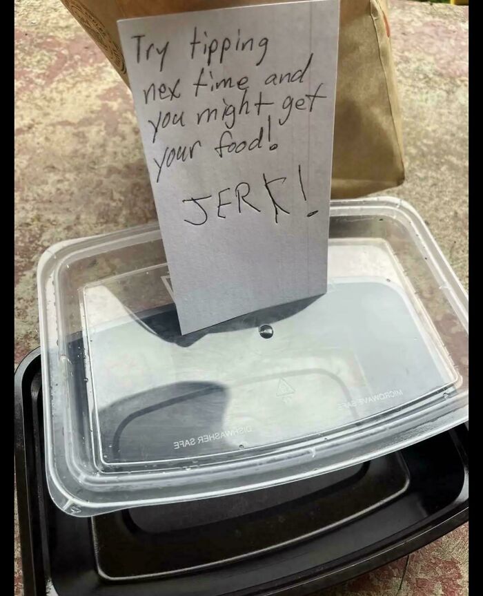 Note on food container about tipping with rude message