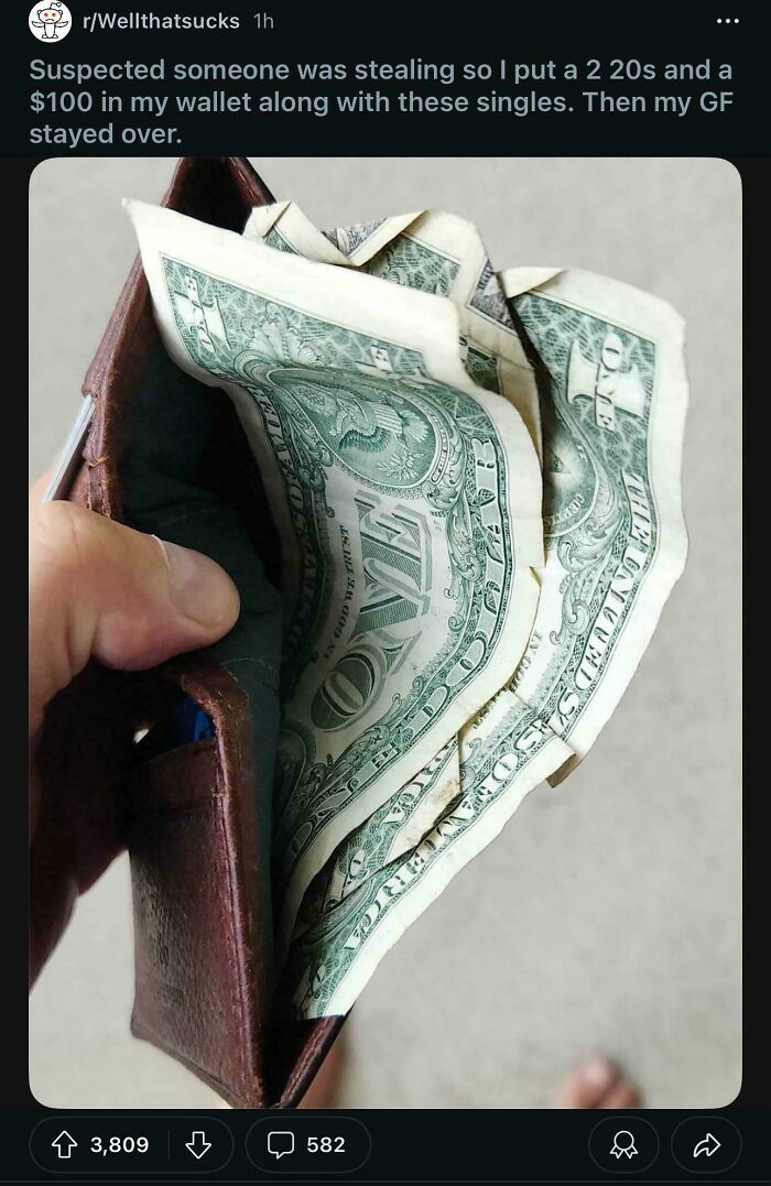 Wallet with dollar bills folded inside to catch suspected thief caught fake internet points