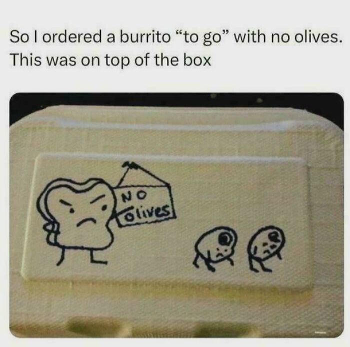 Takeout box lid with drawing and label stating no olives burrito order