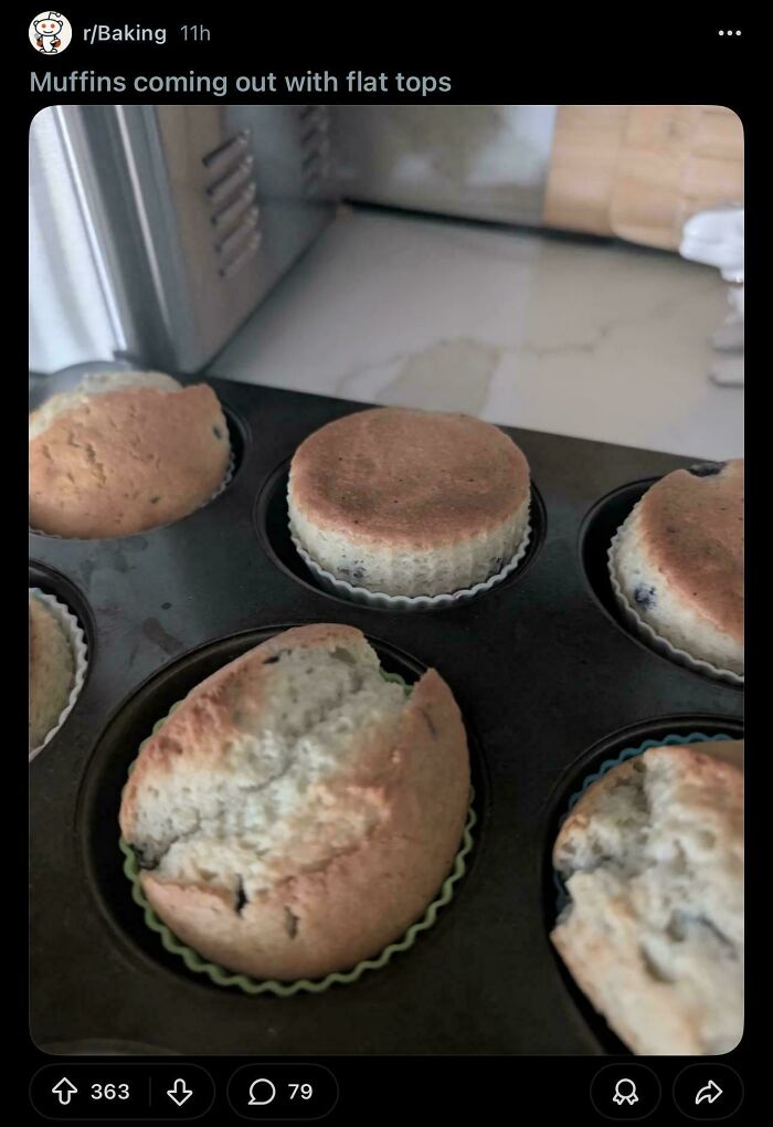 Muffins baking with some having flat tops and others domed imperfections