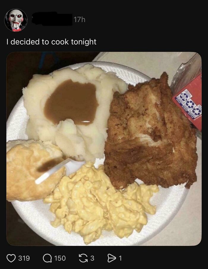 Dinner plate with fried fish, mashed potatoes, macaroni, and biscuit representing home cooking