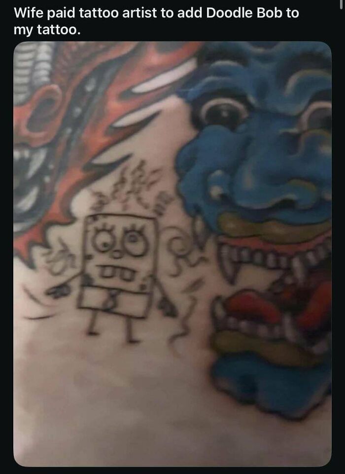 Blue cartoon character tattoo with added sketch of SpongeBob