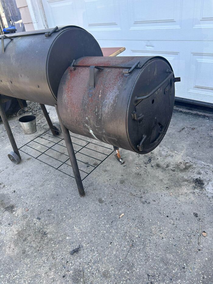 A rusty old smoker, an example of clever solutions made from random junk.