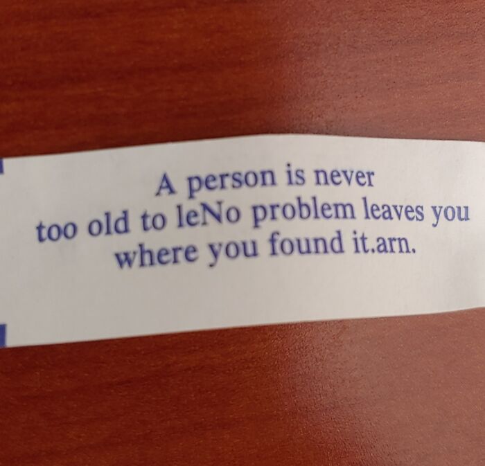 A fortune cookie with a stroke-inducing typo: "A person is never too old to leNo problem leaves you where you found it.arn."