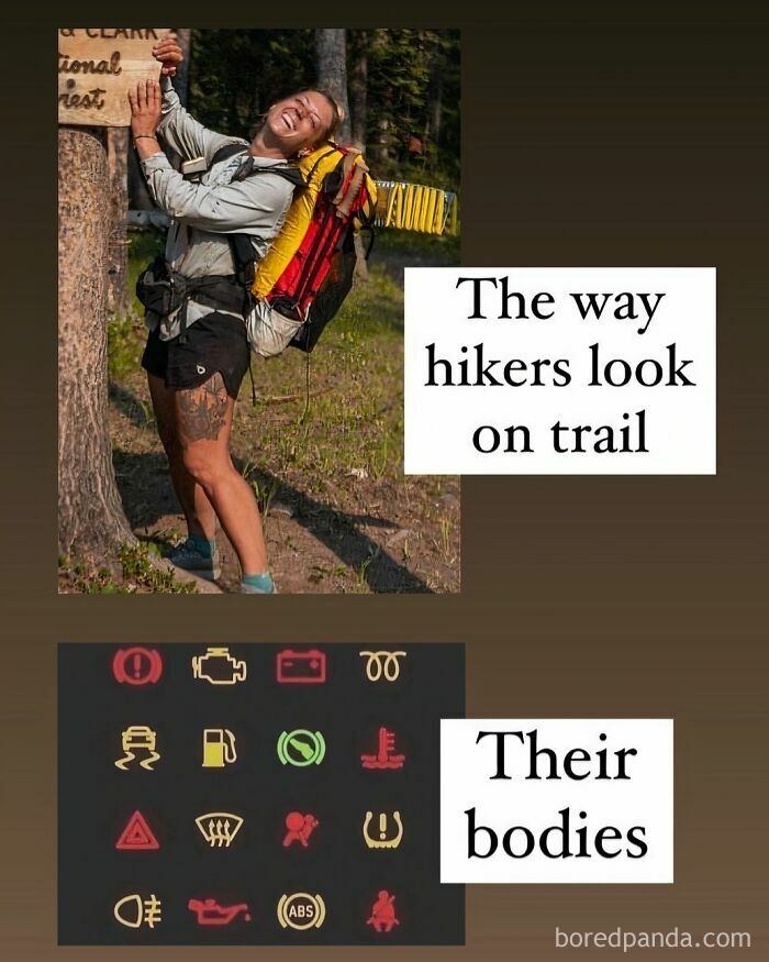 Hiker smiling at forest trail sign comparing hikers to vehicle warning lights