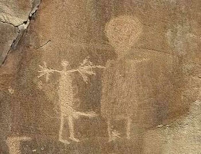 Legend Rock Petroglyph Site In Wyoming Seems To Show An Alien Grey In Front Of A Man