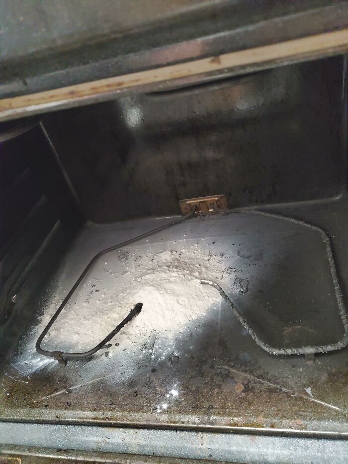 Oven exploded kitchen fail with charred residue and broken heating element