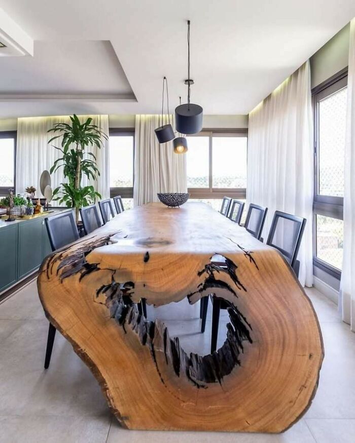 Live edge wooden dining table with natural hollow center