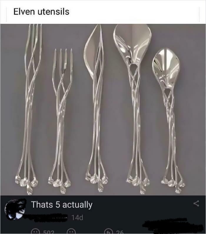 Set of silver elven style intricately designed utensils