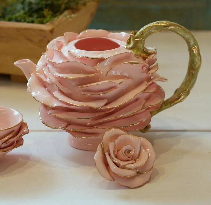 Decorative rose-shaped teapot with intricate cleaning issues
