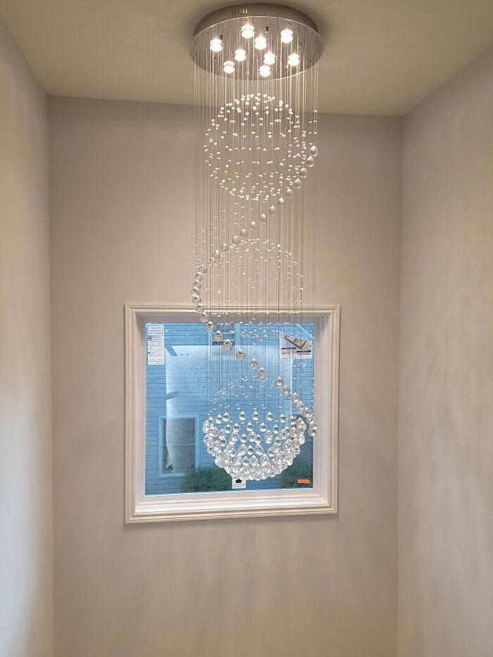 Modern chandelier with hanging crystal balls hard to clean