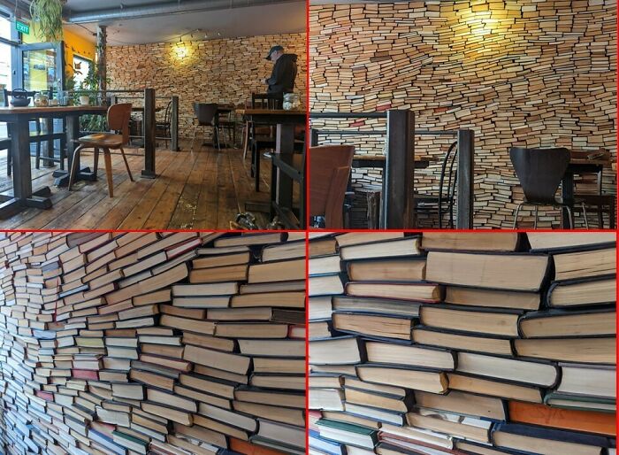 Wall made of unclean stacked books in a restaurant interior