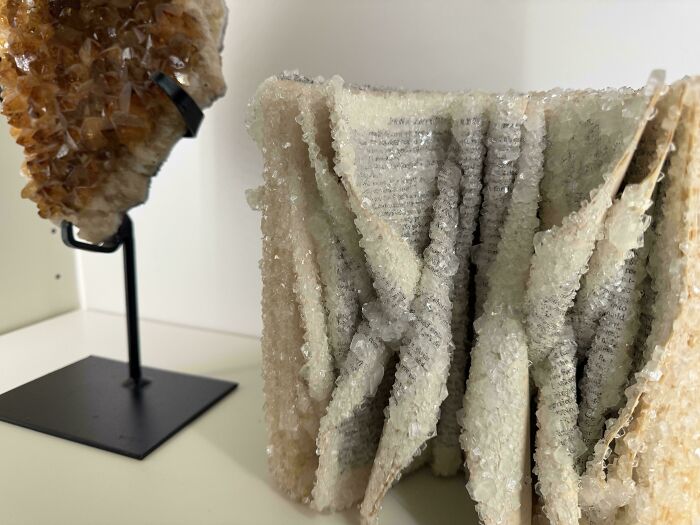 Book covered in crystals illustrating detailed artistic design flaw