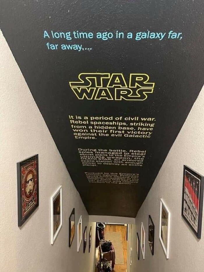 Retro pics of a hallway painted with the Star Wars opening crawl, creating a time machine effect into older times.