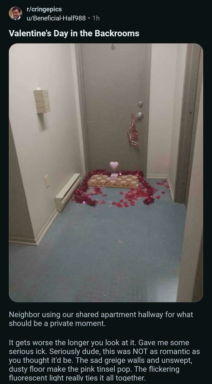 Apartment door decorated with pink tinsel and heart for Valentine's Day