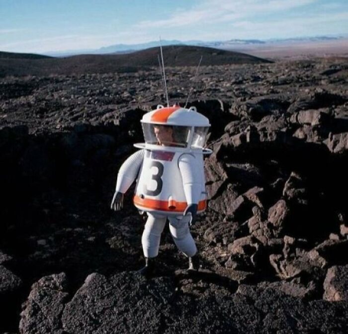 Retrofuturism early astronaut suit designed for rocky terrain exploration