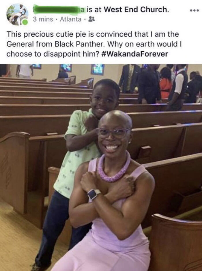 A woman and boy smiling, posing like Black Panther, spreading positivity. Blessed image bringing soul-healing joy.