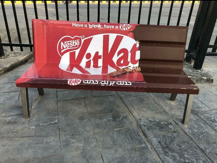 KitKat chocolate bar themed outdoor bench with realistic chocolate bite design