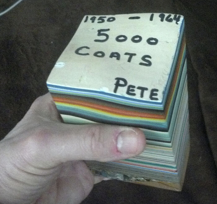 Odd secondhand colorful thick paper stack labeled 5000 coats