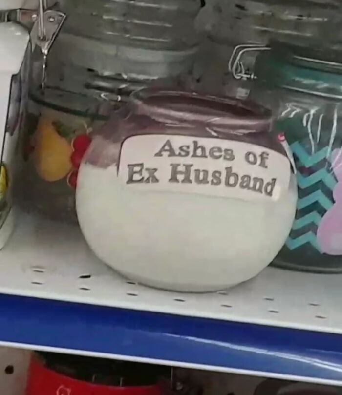 Funny secondhand urn labeled ashes of ex husband in a store display