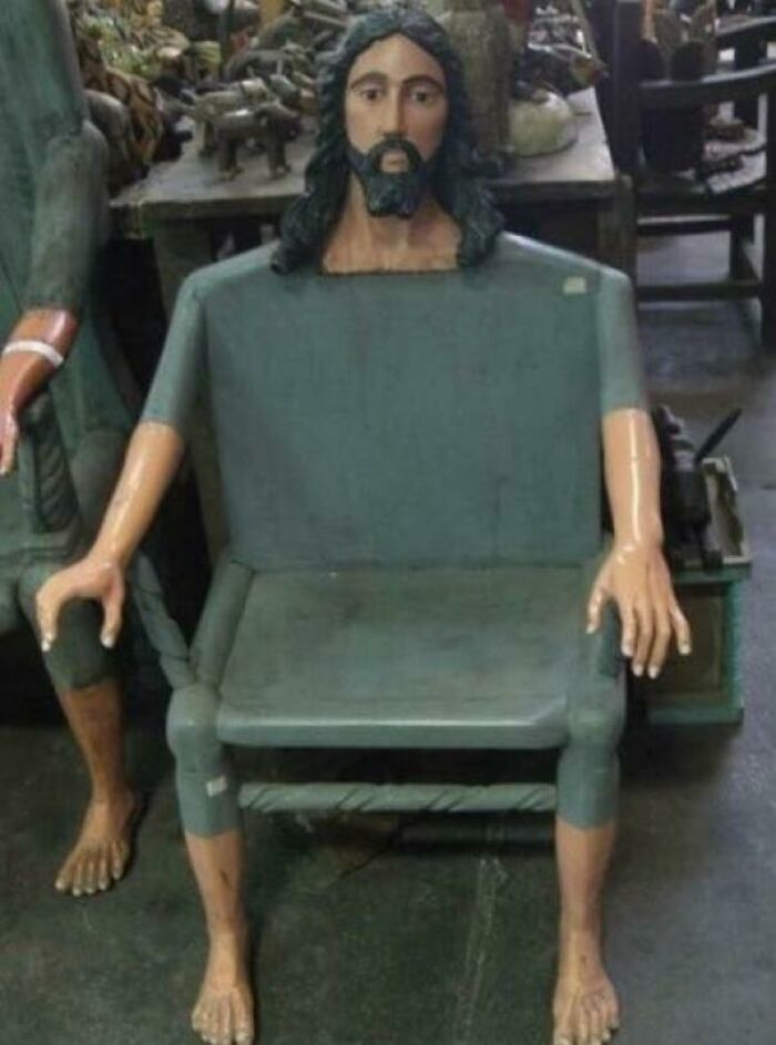 Unusual chair designed as human figure with painted face and limbs