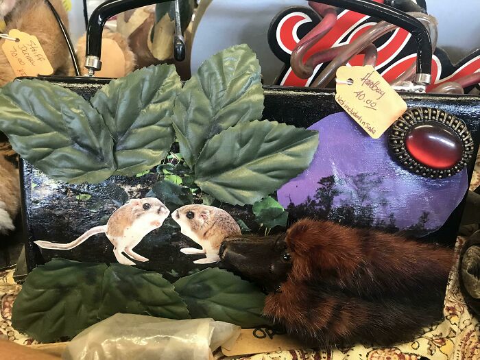 Weird secondhand handbag featuring animal faces and faux leaves decoration