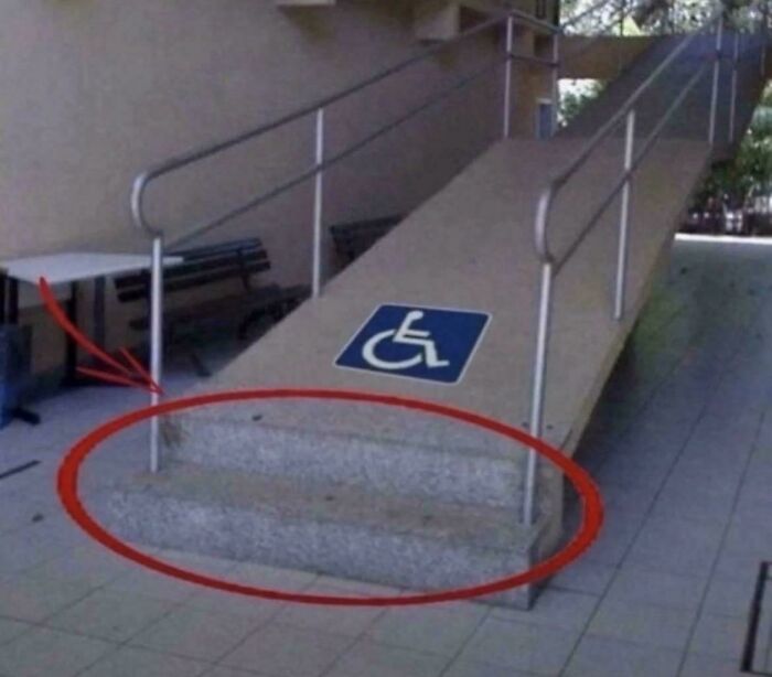Wheelchair ramp with steps defeating its purpose and accessibility
