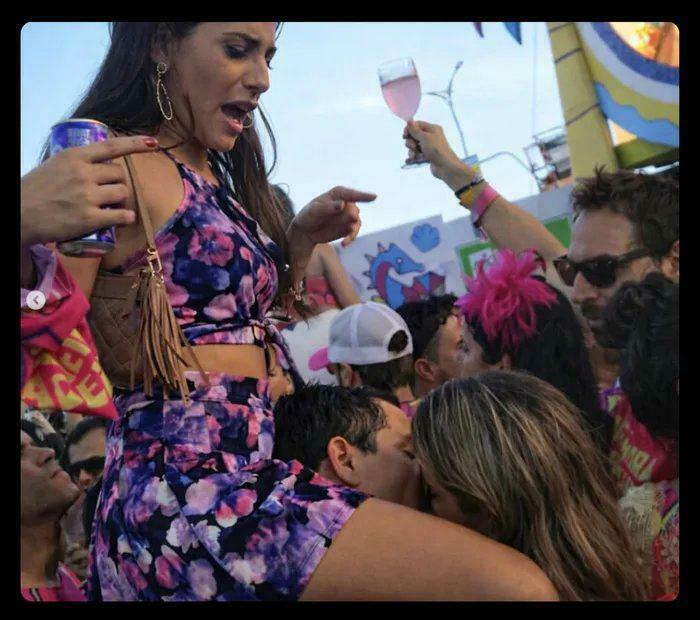 Woman reacting in surprise at a crowded party scene in hmmm images