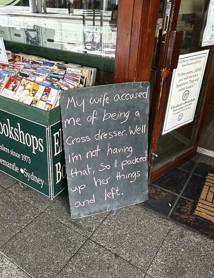 Funny bookstore chalkboard sign about cross dresser accusation joke