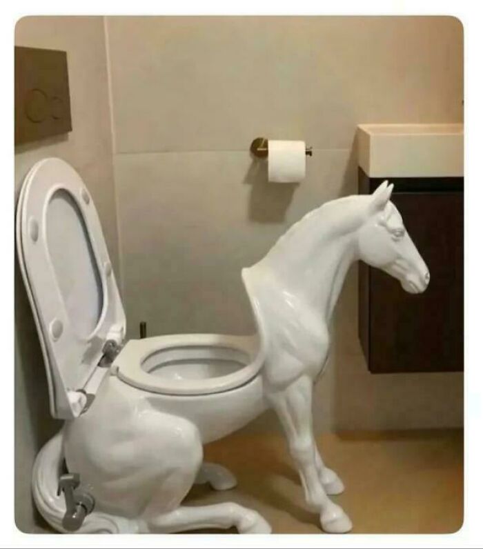 A white toilet with a horse-shaped base, combining toilet and horse sculpture