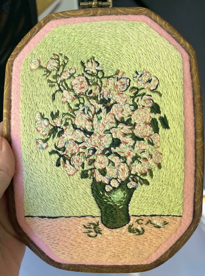 Beautifully stitched white flowers in a vase from embroidery projects