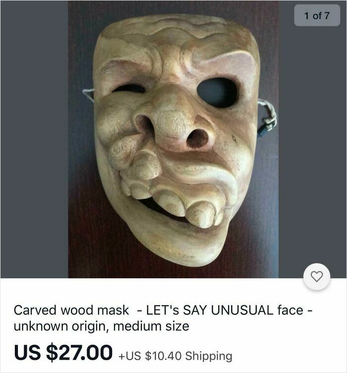 Carved wood mask with unusual face and distorted features secondhand find