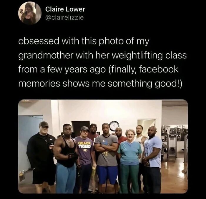 Grandmother posing with weightlifting class showing inspiring wholesome moments