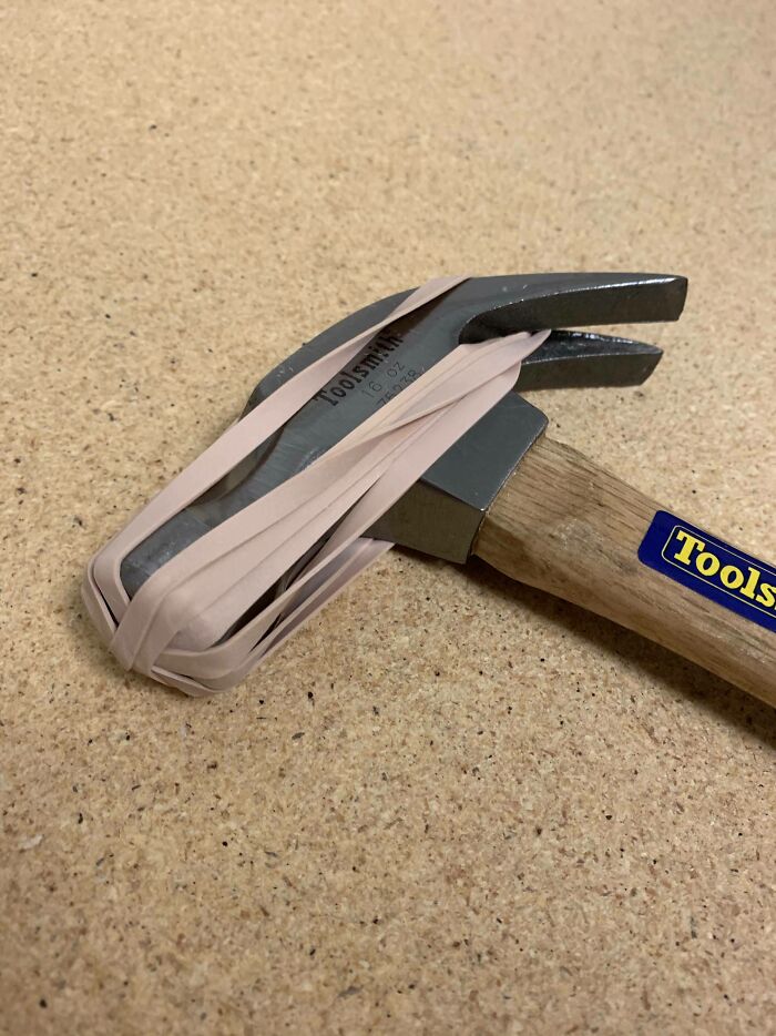 Hammer secured with rubber bands as a low-tech grip or holder