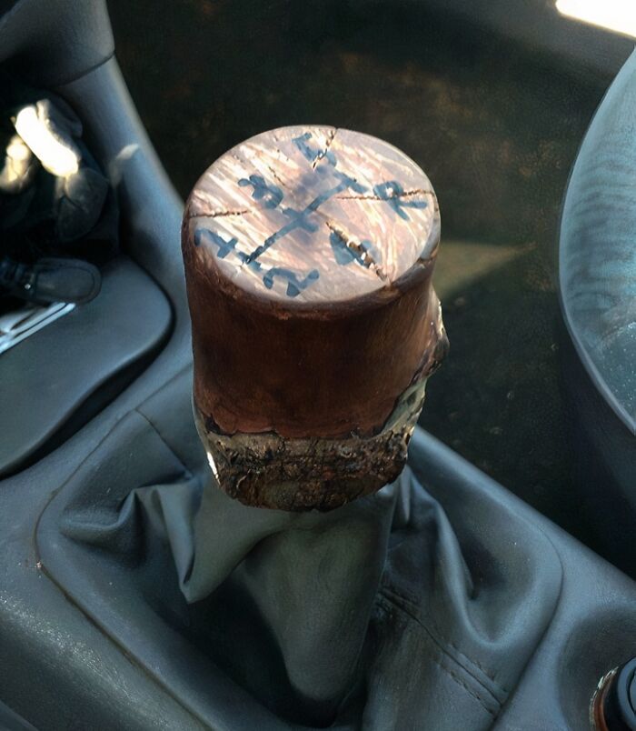 Car gear shift k**b replaced with a rustic wooden handle as low-tech upgrade