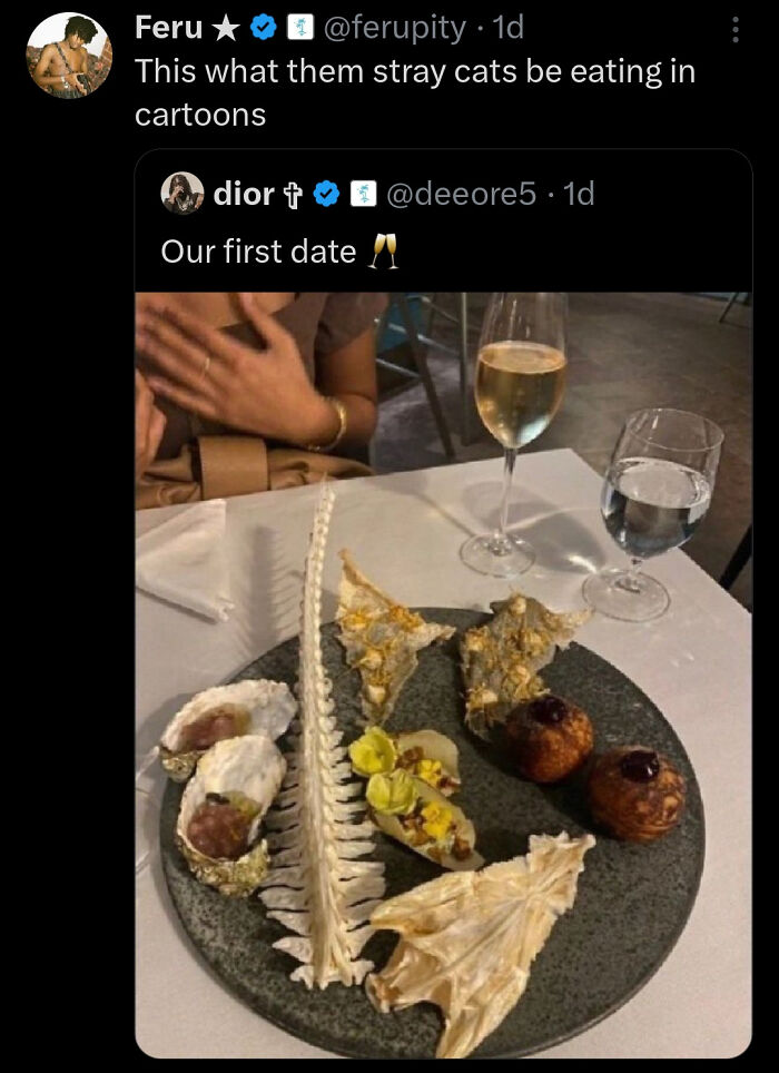 Plate with fish bones and odd food items roasted as disgusting dishes