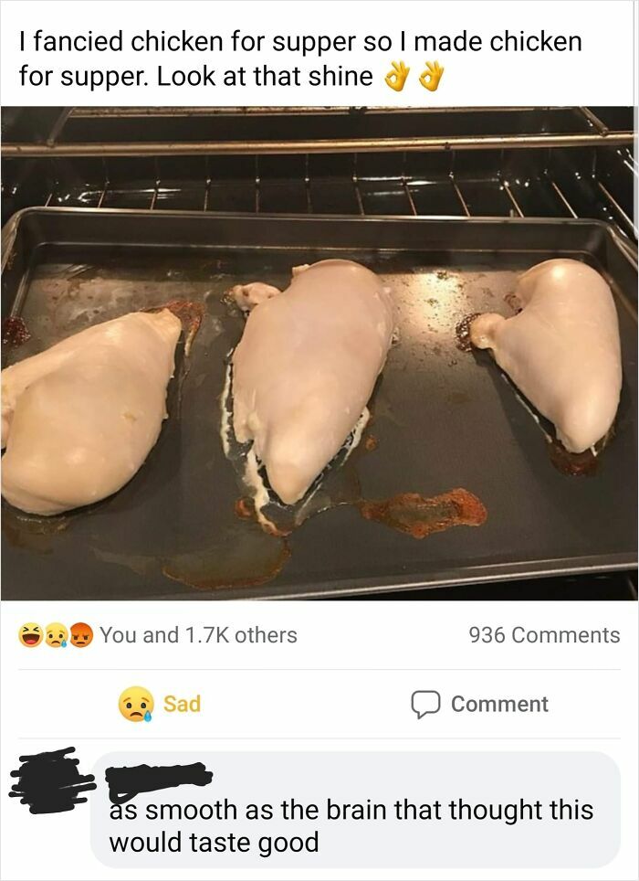 Overcooked chicken breasts with pale skin on baking tray after roasting