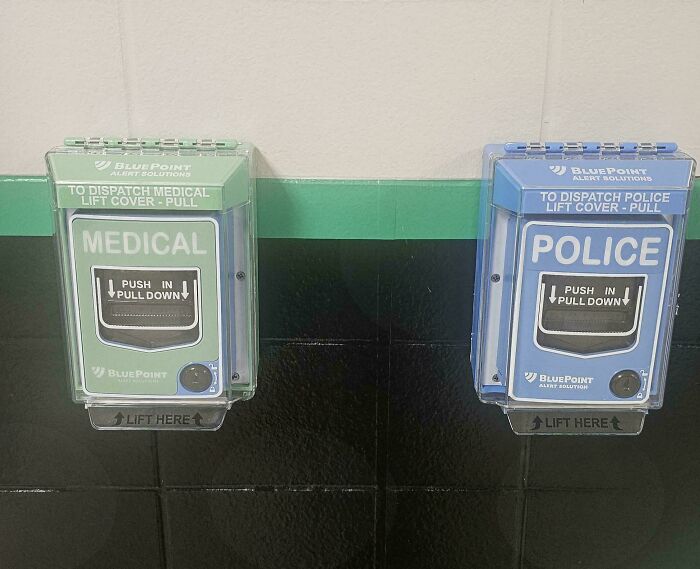 Medical and police emergency dispatch pull boxes mounted on a wall