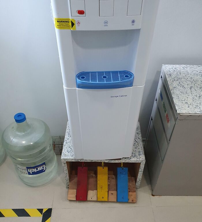 Water dispenser with foot pedal controls for hands-free use