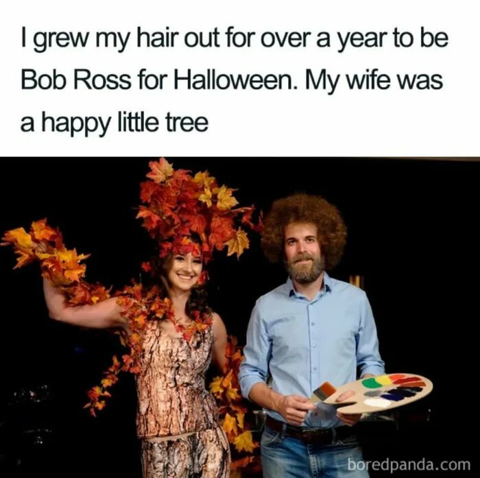 Couple in Halloween costumes as Bob Ross and a happy little tree with fall leaves