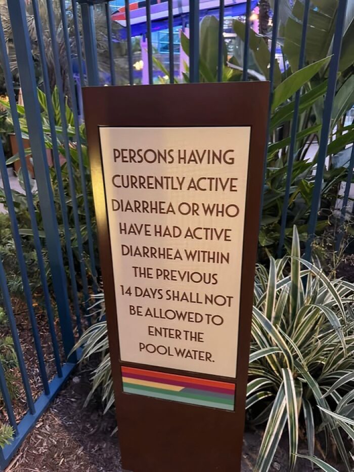 Absurd pool sign banning persons with active diarrhea from entering pool water