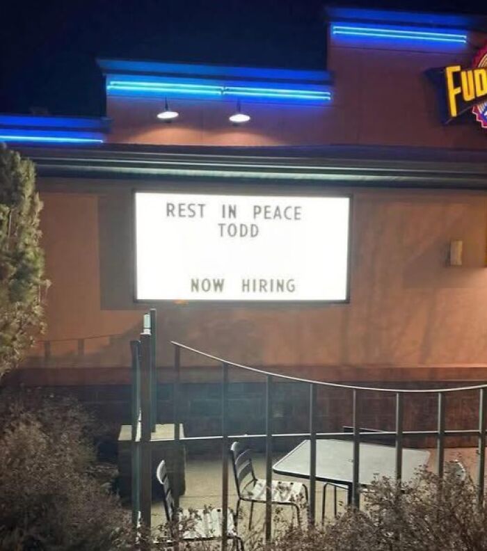 Humorous restaurant sign memorializing Todd and announcing hiring